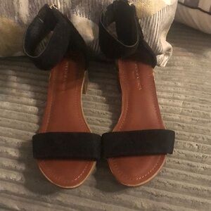 Rock & Candy Black tassle ankle strap low heeled sandals